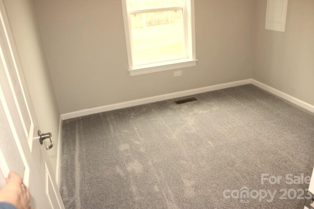 314 John Smith Road Rutherfordton, NC 28139 - Photo 24 of 25 an empty room with a window