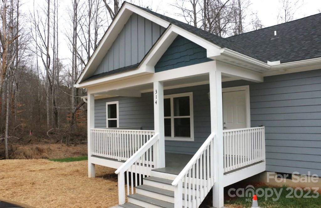 314 John Smith Road Rutherfordton, NC 28139 - Photo 3 of 25 a view of a house with a window and wooden fence