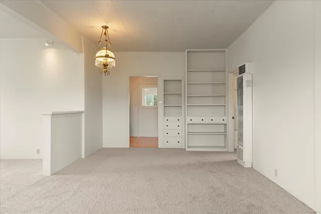 wooden view of a room with cabinet and mirrors