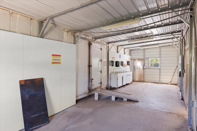 a view of a backyard with a small cabin