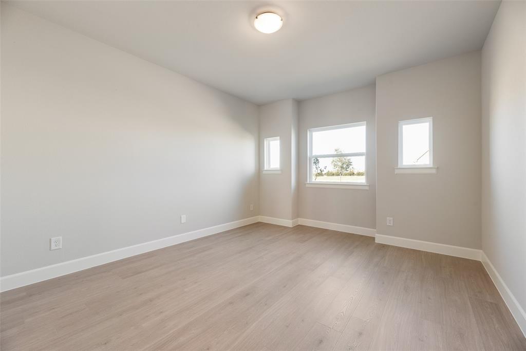 5251 Sunset Road Caddo Mills, TX 75135 - Photo 13 of 32 an empty room with windows