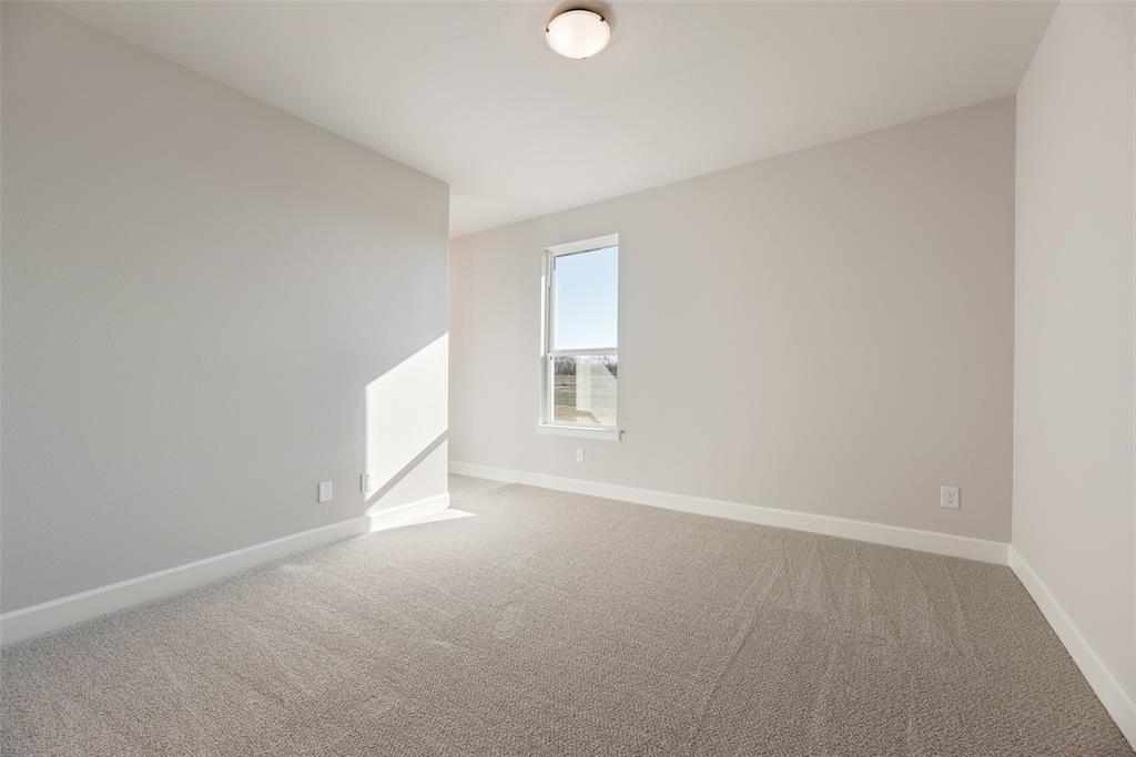 5251 Sunset Road Caddo Mills, TX 75135 - Photo 14 of 32 a view of an empty room with a window