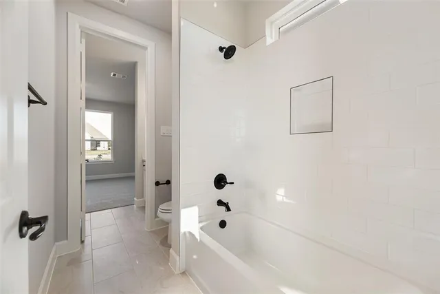 a bathroom with a bathtub