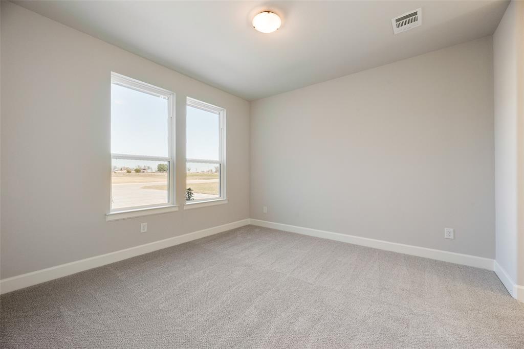 5251 Sunset Road Caddo Mills, TX 75135 - Photo 20 of 32 an empty room with a window