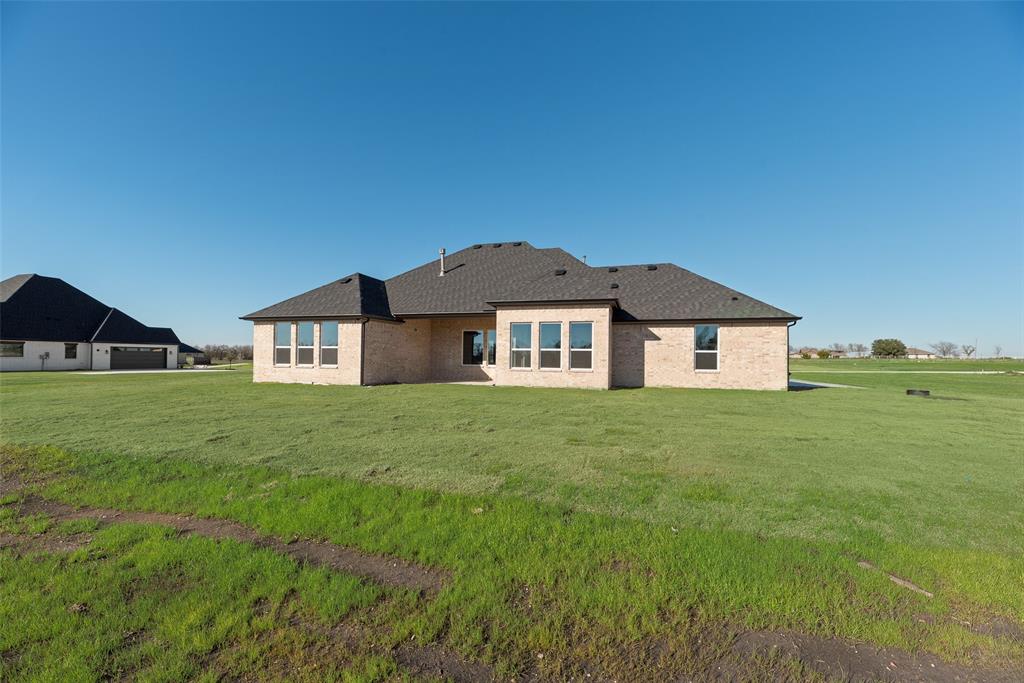 5251 Sunset Road Caddo Mills, TX 75135 - Photo 30 of 32 a front view of a house with garden