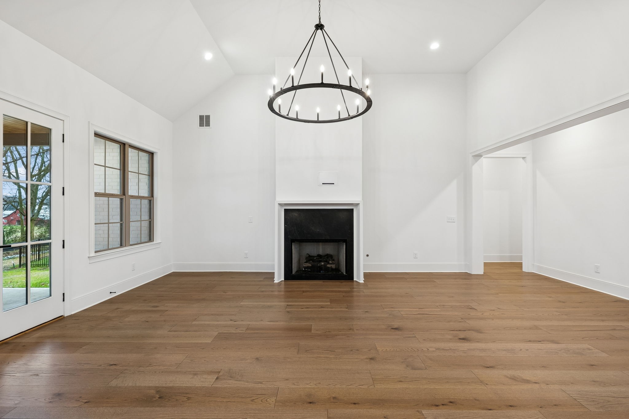 209 Bellsford Road Gallatin, TN 37066 - Photo 17 of 68 a view of a room with wooden floor fireplace and window