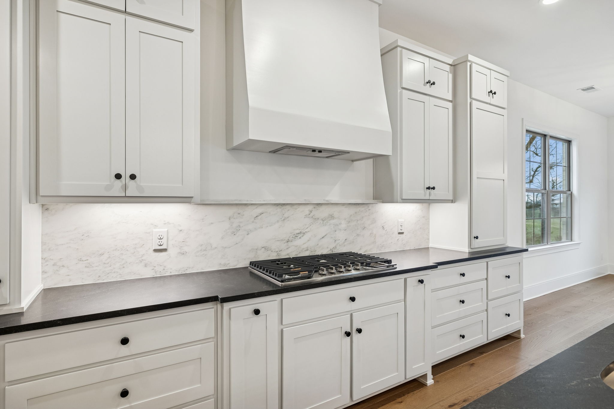 209 Bellsford Road Gallatin, TN 37066 - Photo 22 of 68 a kitchen with granite countertop white cabinets and sink