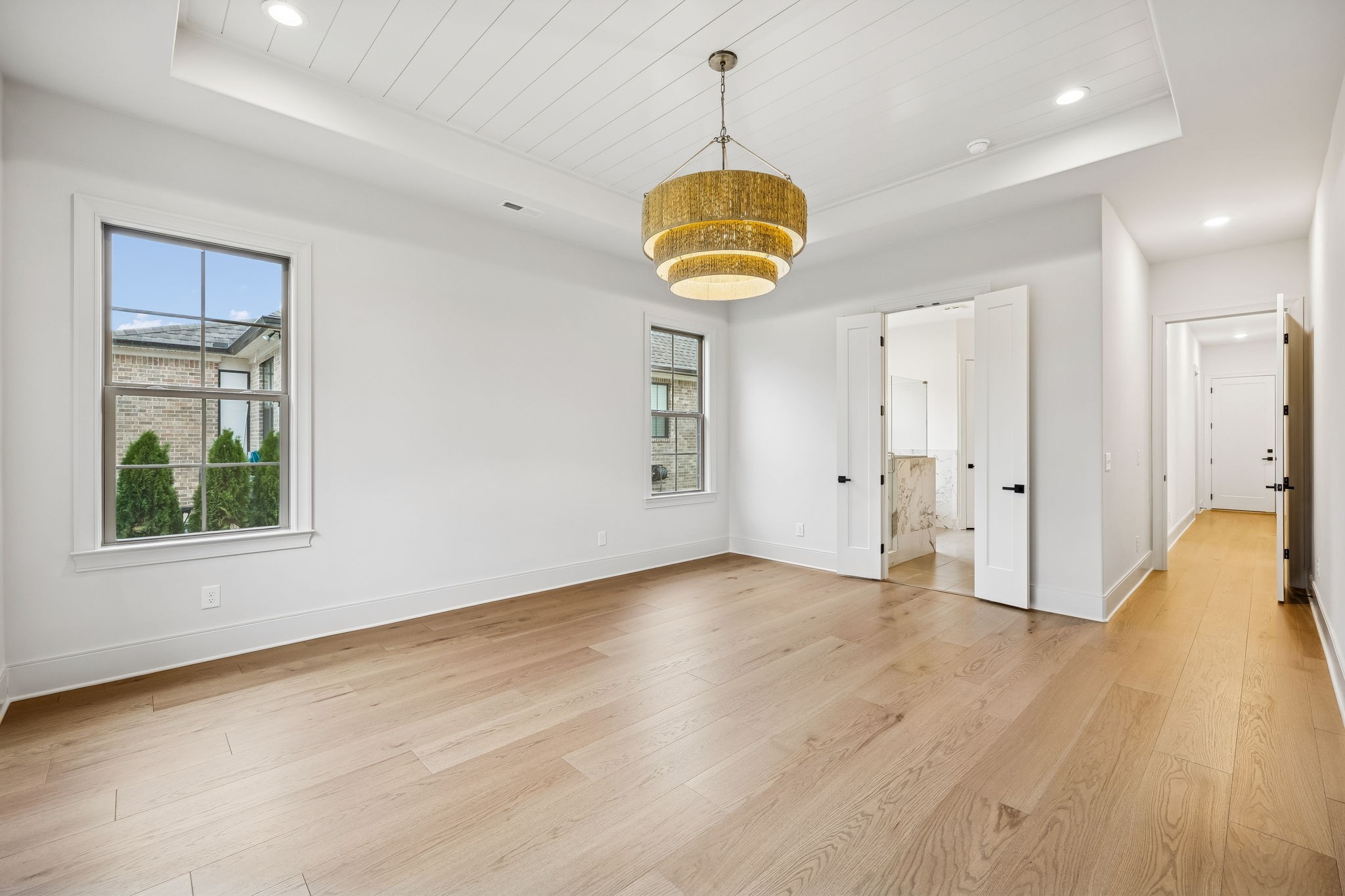 209 Bellsford Road Gallatin, TN 37066 - Photo 29 of 68 a view of an empty room with wooden floor and a window
