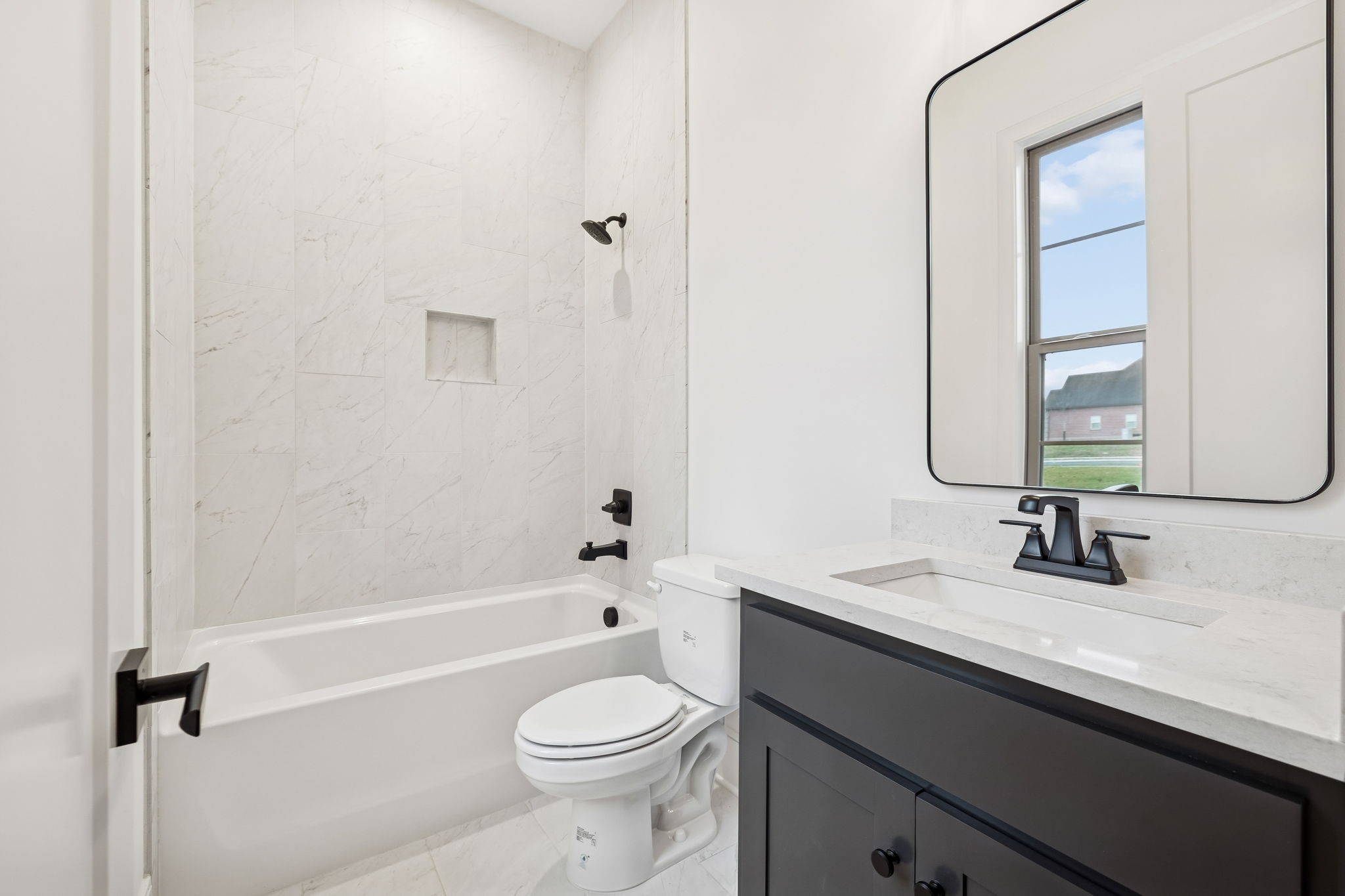 209 Bellsford Road Gallatin, TN 37066 - Photo 46 of 68 a bathroom with a sink a toilet and shower