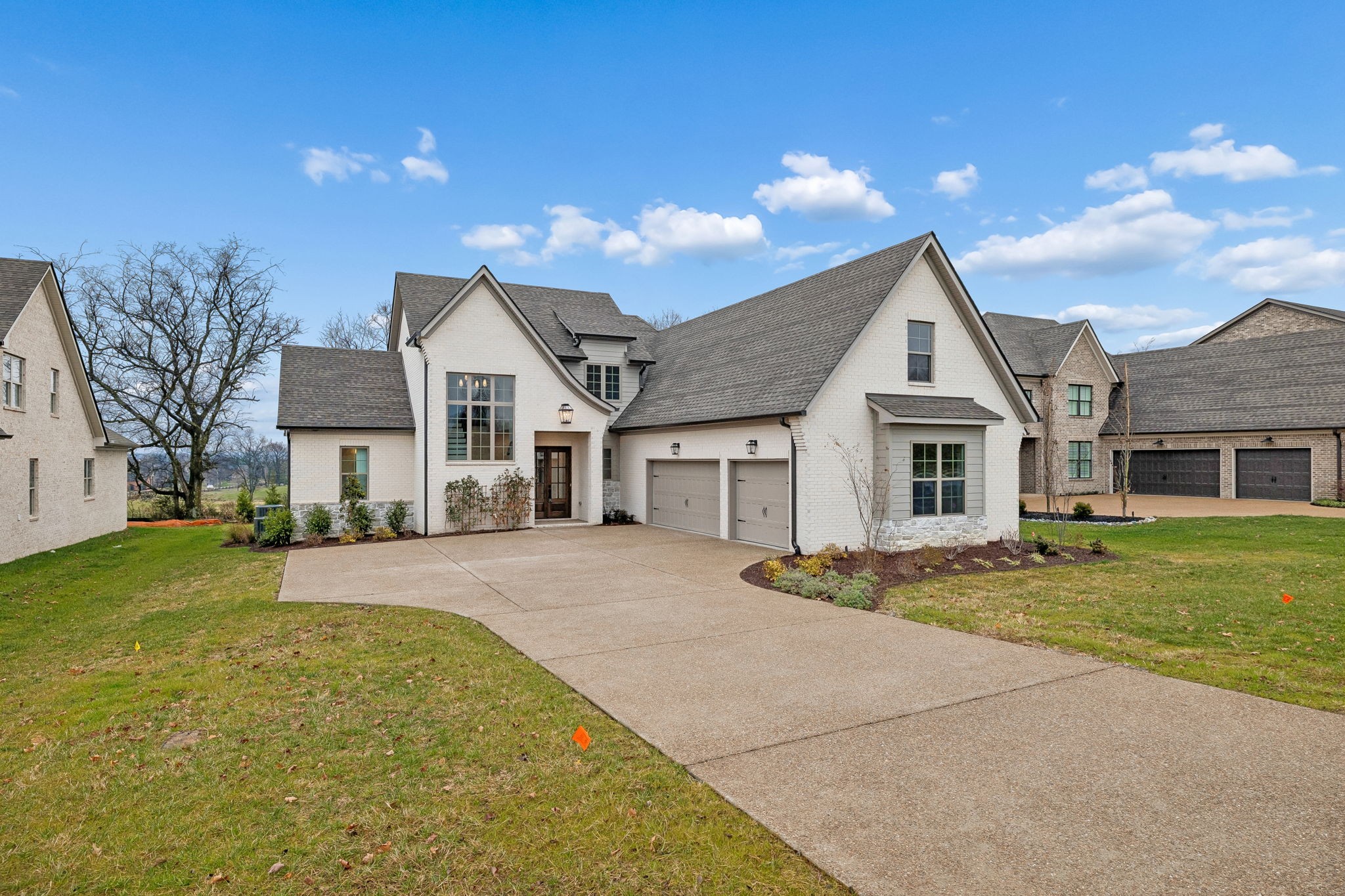 209 Bellsford Road Gallatin, TN 37066 - Photo 5 of 68 a front view of a house with a garden and yard