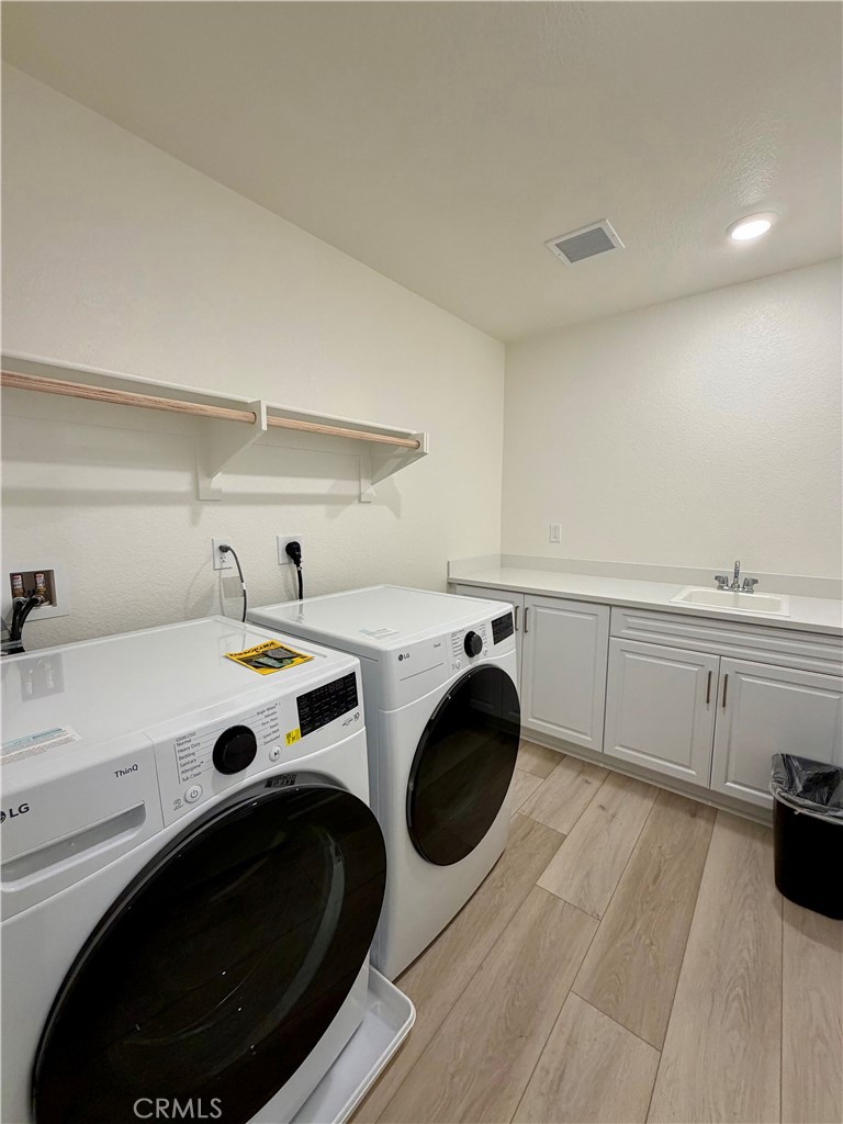 9643 Babaco Street Riverside, CA 92508 - Photo 14 of 18 Laundry Room