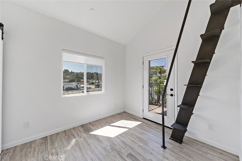 4620 Eagle Rock Boulevard, Unit 1/2 Eagle Rock, CA 90041 - Photo 11 of 26 a view of an entryway with wooden floor and door