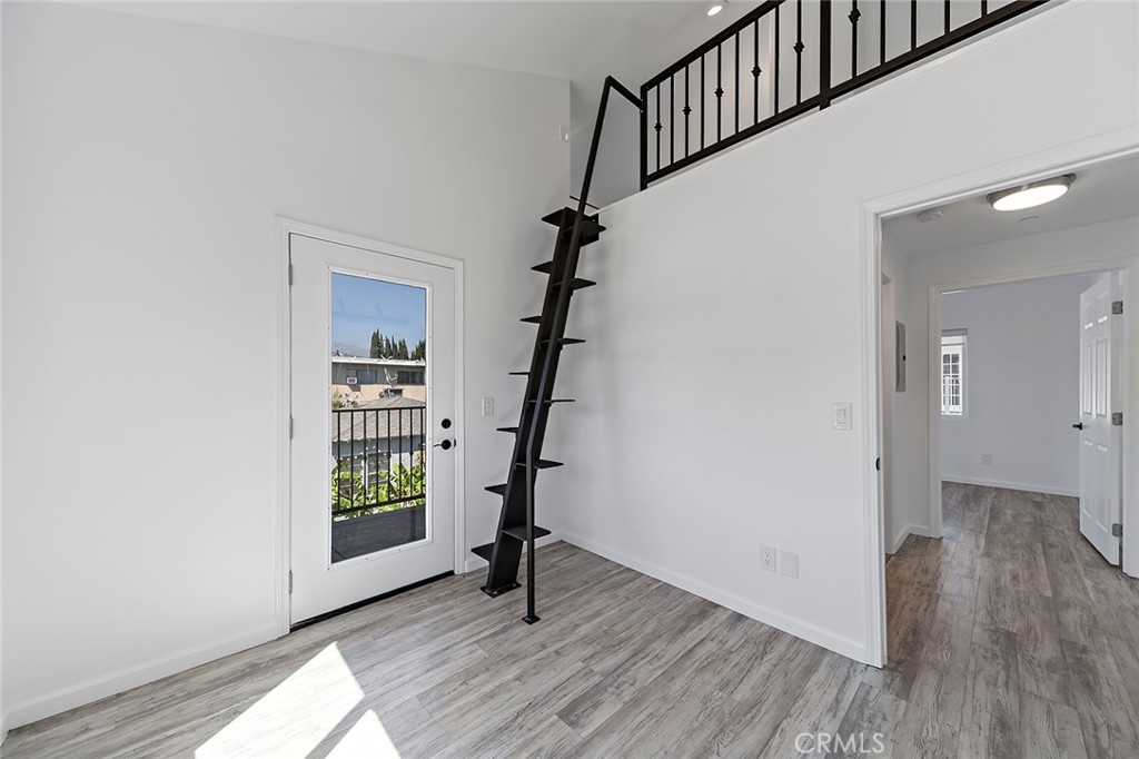 4620 Eagle Rock Boulevard, Unit 1/2 Eagle Rock, CA 90041 - Photo 12 of 26 a view of an entryway with wooden floor and stairs