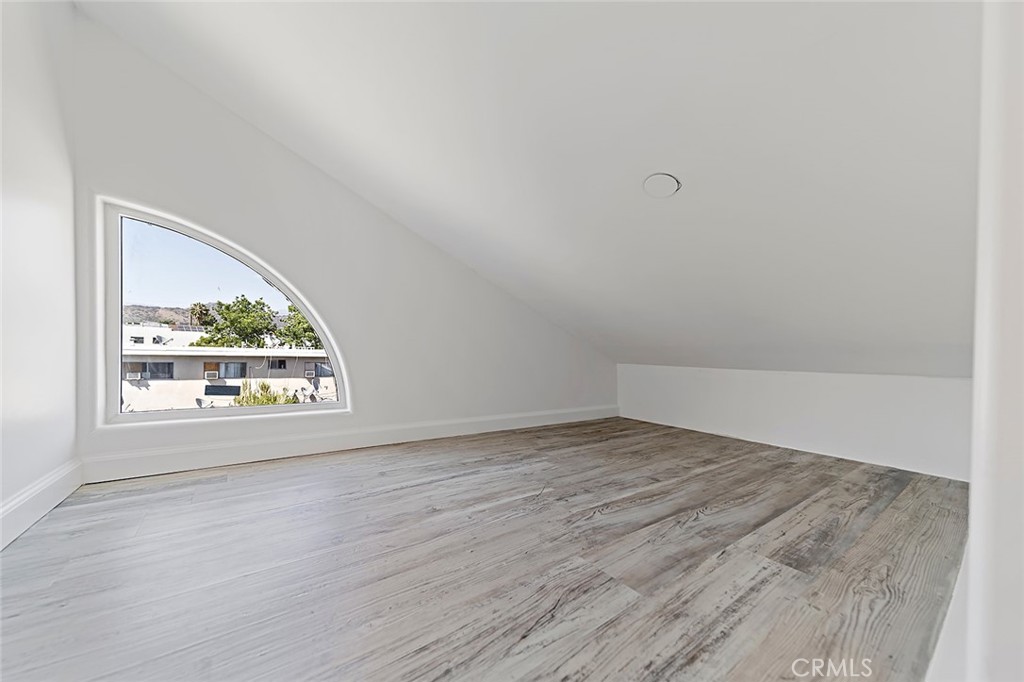 4620 Eagle Rock Boulevard, Unit 1/2 Eagle Rock, CA 90041 - Photo 19 of 26 an empty room with a window