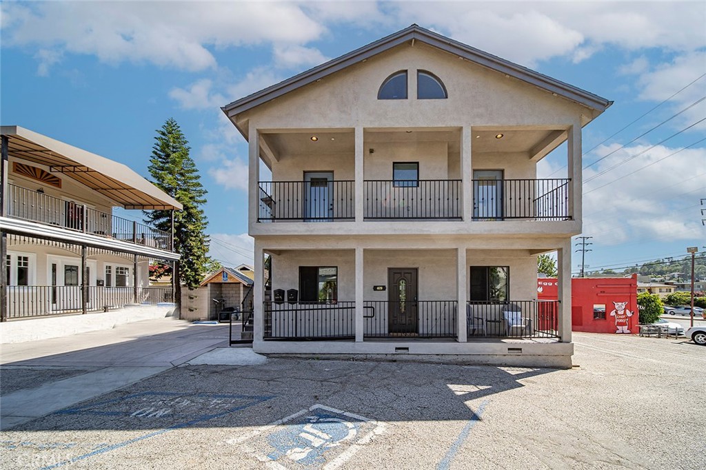 4620 Eagle Rock Boulevard, Unit 1/2 Eagle Rock, CA 90041 - Photo 2 of 26 a front view of a house with a yard