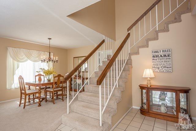 4347 Laurelhurst Road Moorpark, CA 93021 - Photo 13 of 23 a dining room with furniture entryway and stairs