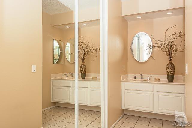 4347 Laurelhurst Road Moorpark, CA 93021 - Photo 15 of 23 a bathroom with a double vanity sink mirror and