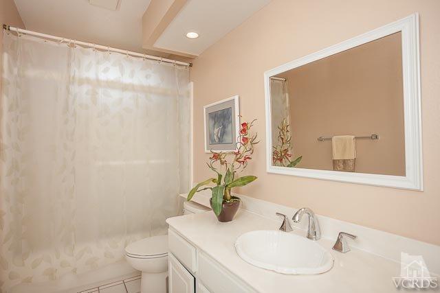 4347 Laurelhurst Road Moorpark, CA 93021 - Photo 18 of 23 a bathroom with a sink toilet and shower