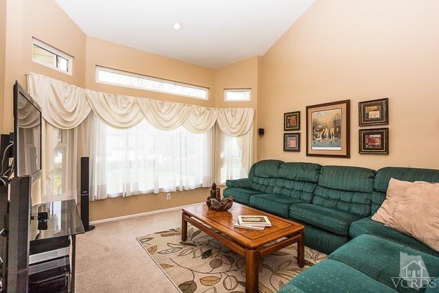 4347 Laurelhurst Road Moorpark, CA 93021 - Photo 3 of 23 a living room with furniture a table and a window