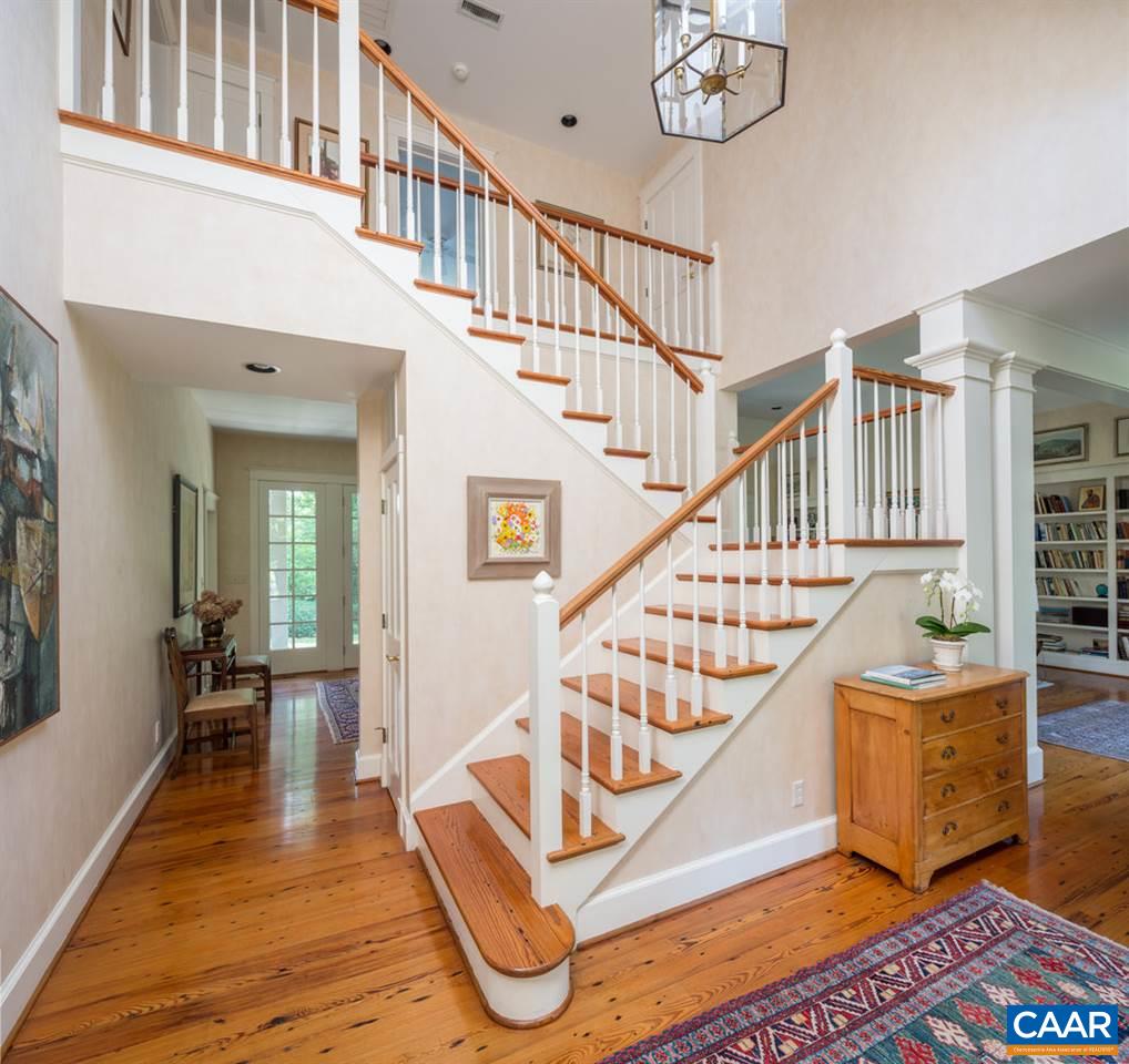 4054 Garth Road Crozet, VA 22932 - Photo 11 of 50 a view of entryway and hall with wooden floor