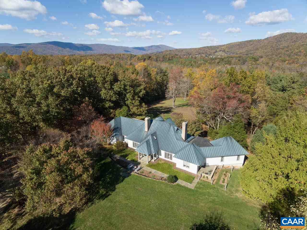 4054 Garth Road Crozet, VA 22932 - Photo 2 of 50 an aerial view of a house with a yard and lake view