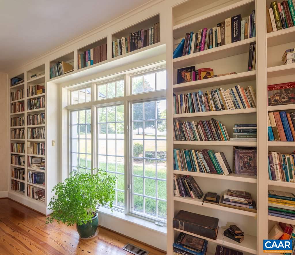 4054 Garth Road Crozet, VA 22932 - Photo 24 of 50 a book shelf with books and a book shelf