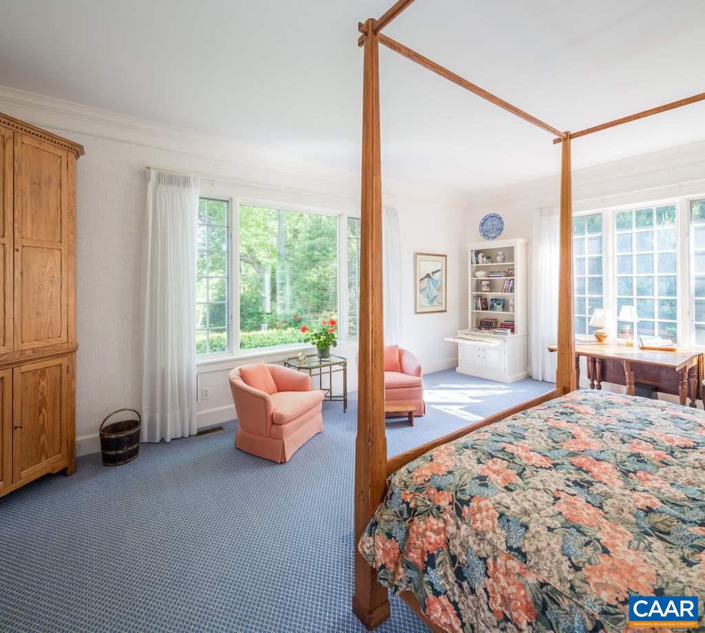 4054 Garth Road Crozet, VA 22932 - Photo 27 of 50 a bedroom with furniture and large windows