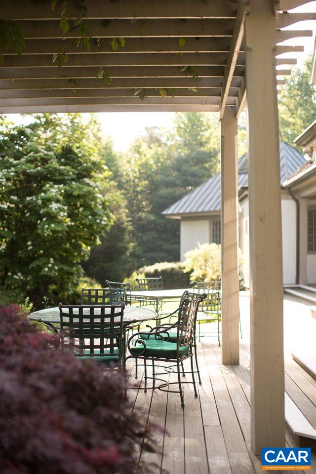 4054 Garth Road Crozet, VA 22932 - Photo 36 of 50 a view of a chairs and table in the balcony