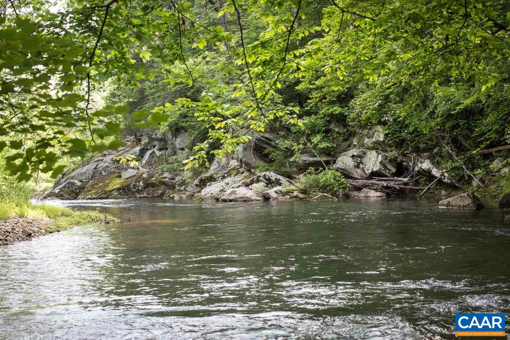 4054 Garth Road Crozet, VA 22932 - Photo 45 of 50 a view of a large body of water with a large tree