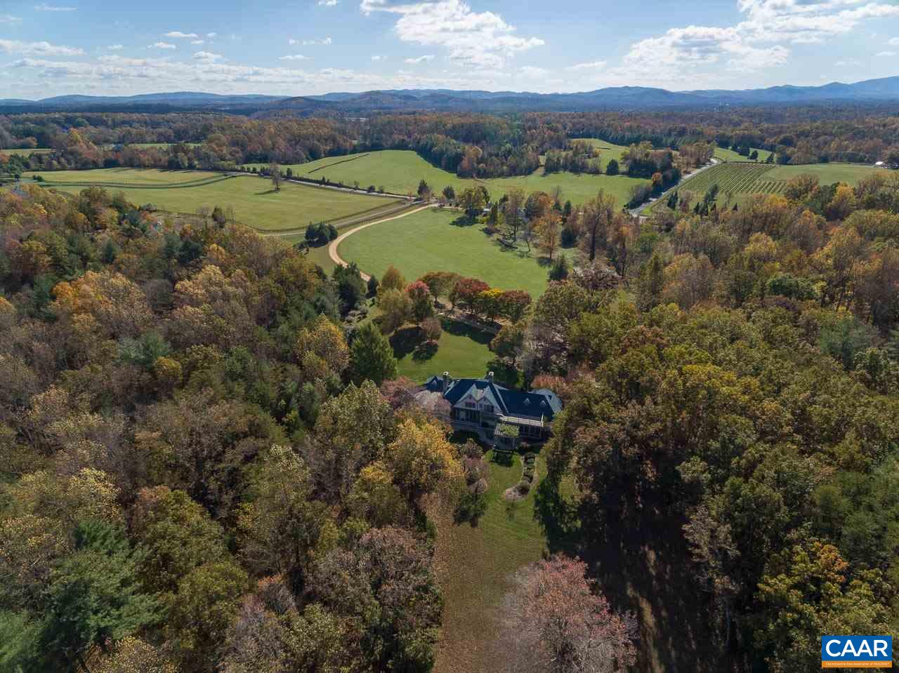 4054 Garth Road Crozet, VA 22932 - Photo 49 of 50 a view of a lake with a mountain
