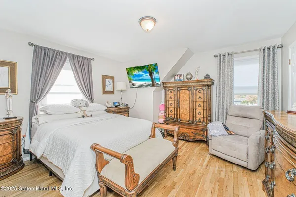 a bed room with a bed and a couch