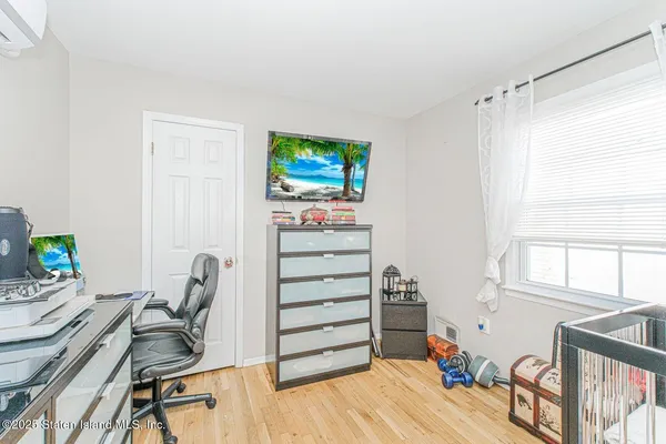 a room with furniture and a window