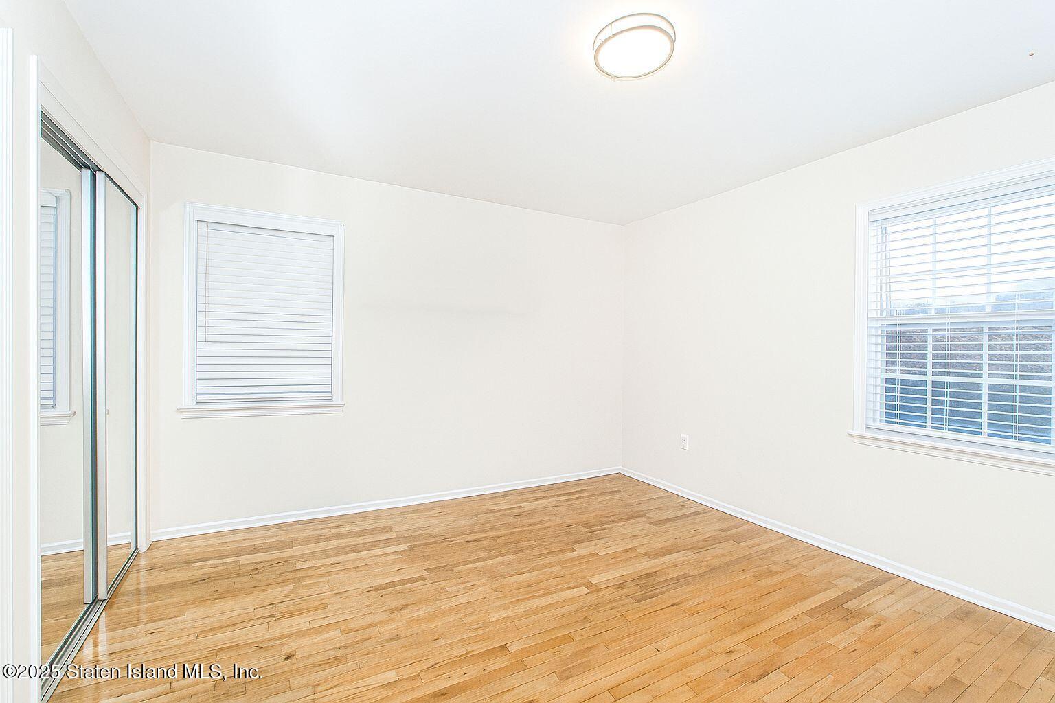 45 Lenevar Avenue Staten Island, NY 10309 - Photo 23 of 35 a view of a room with wooden floor and fan