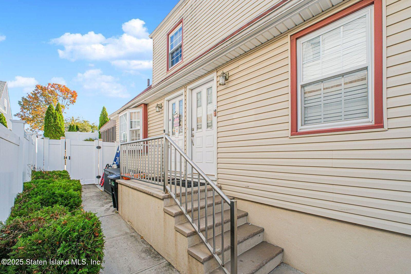 45 Lenevar Avenue Staten Island, NY 10309 - Photo 4 of 35 a view of a balcony with chairs