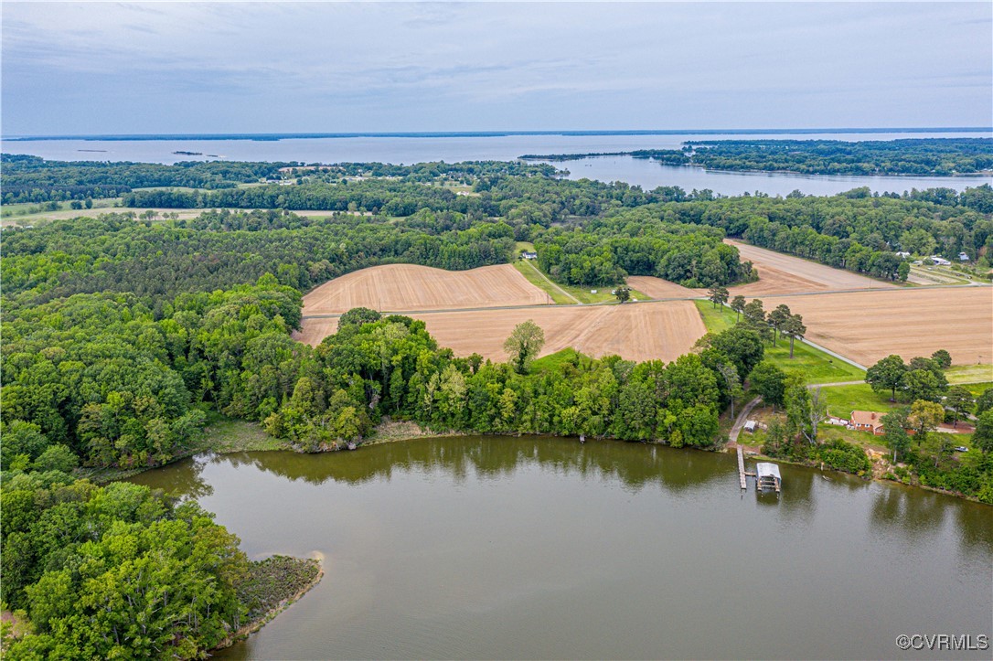 a view of a lake with a building in the background