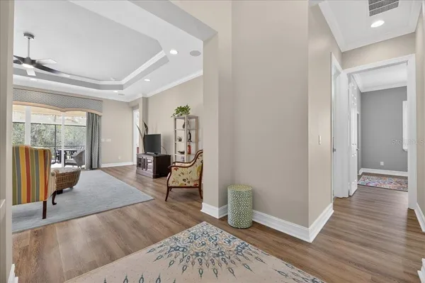 a living room with furniture and a rug