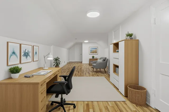 a living room with furniture and a table