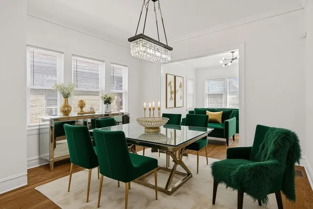 a view of a dining room with furniture window and outside view