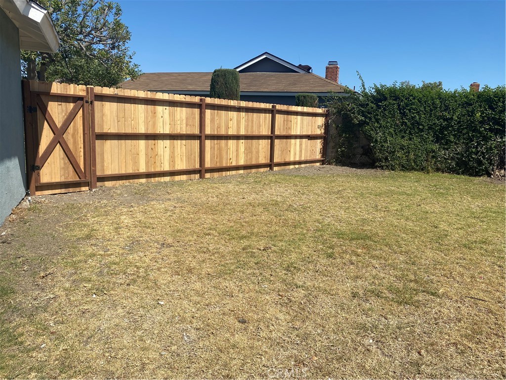 9132 Margate Circle Westminster, CA 92683 - Photo 15 of 16 a front view of a house with a yard and garage