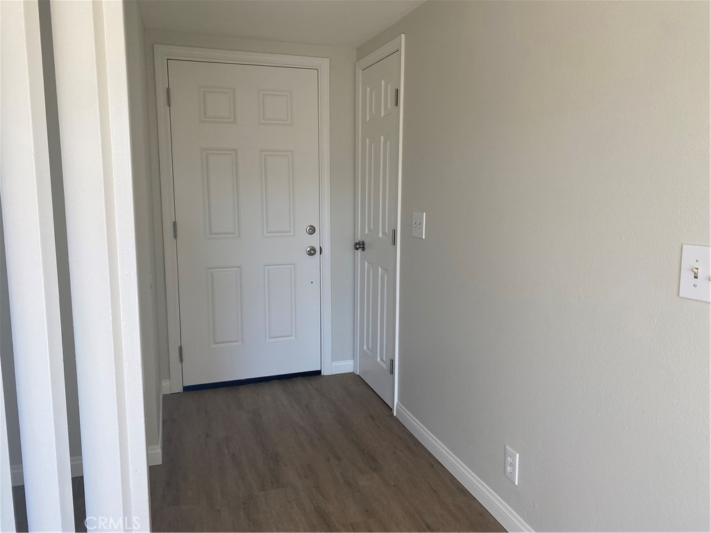 9132 Margate Circle Westminster, CA 92683 - Photo 10 of 16 a view of hallway with wooden floor