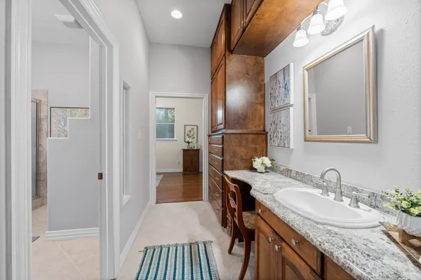 a bathroom with a tub and a shower