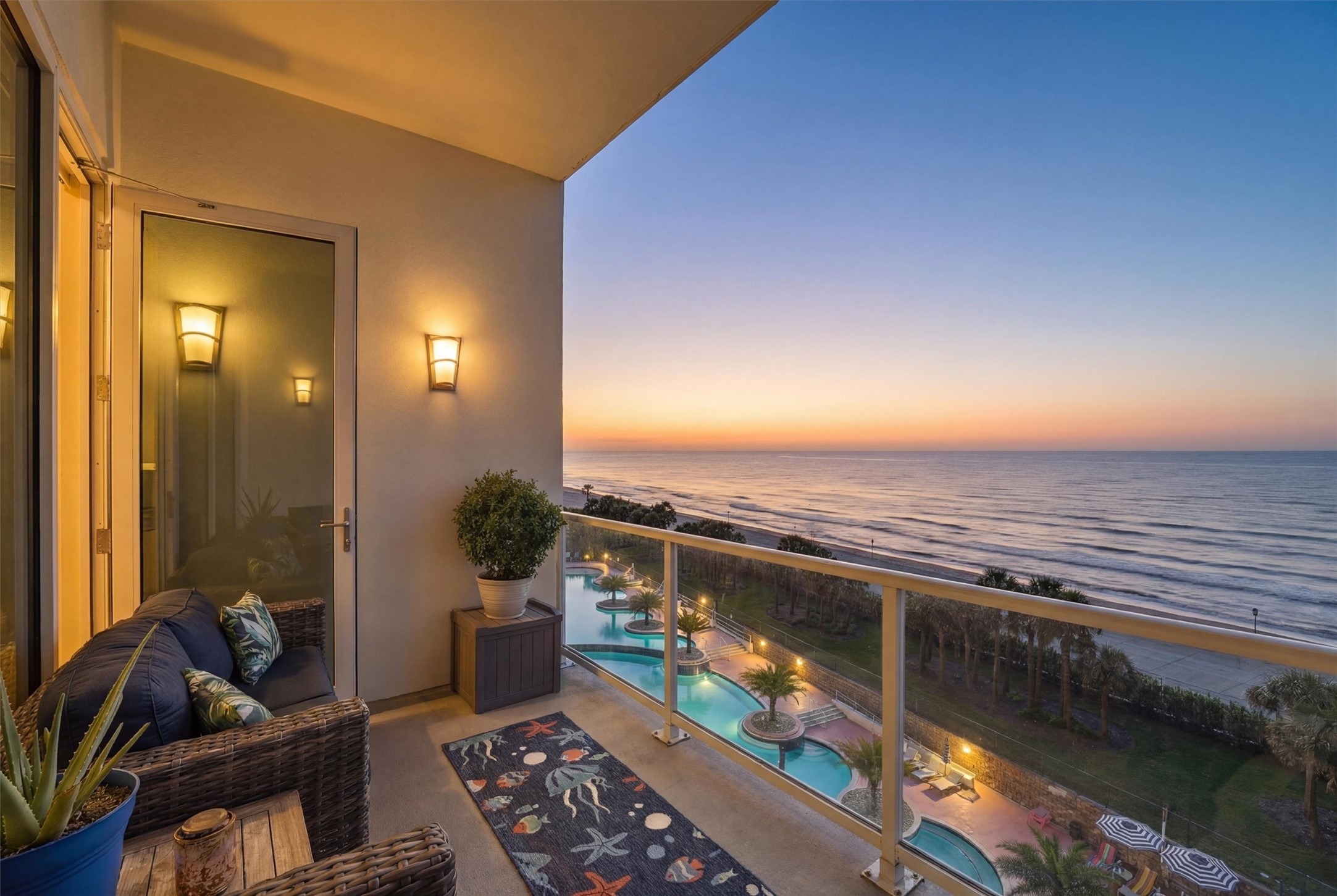 10327 Termini-San Luis Pass Road, Unit 616 Galveston, TX 77554 - Photo 24 of 38 a view of a balcony with chair and tables