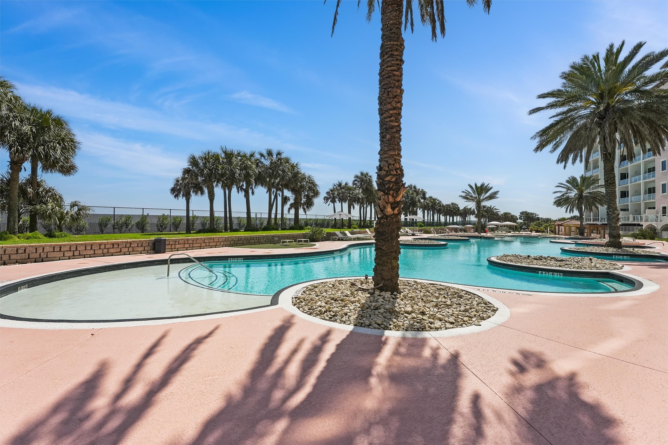 10327 Termini-San Luis Pass Road, Unit 616 Galveston, TX 77554 - Photo 38 of 38 a view of a swimming pool with a patio and a yard