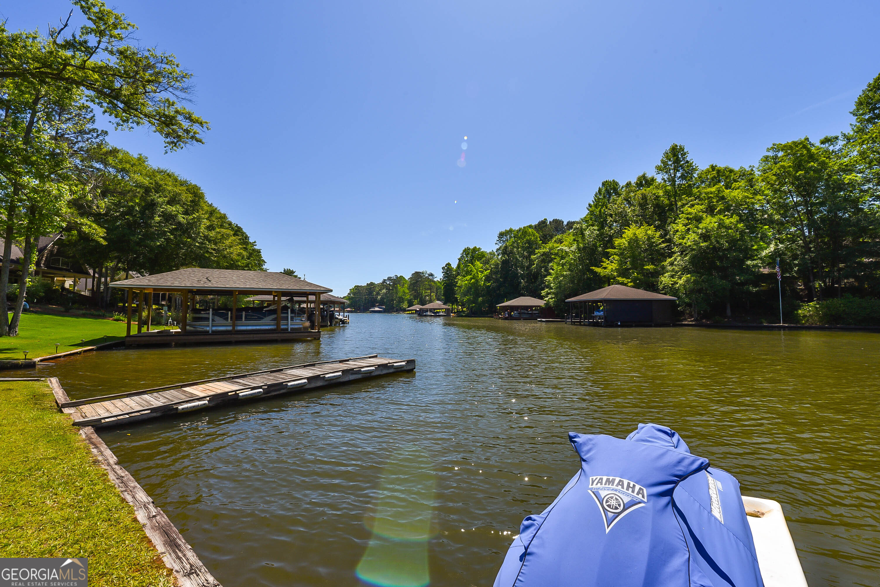 209 Lee Road Salem, AL 36874 - Photo 3 of 37 a view of a lake with a house in the background