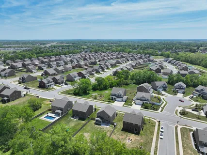 an aerial view of a city with lots of residential buildings