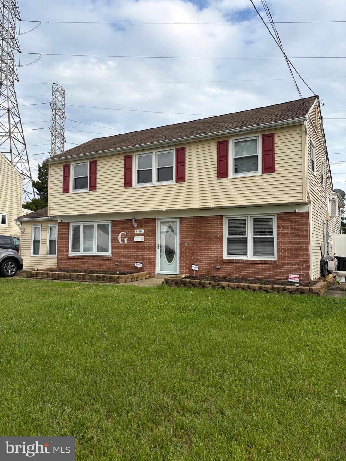 7404 Wyndam Road Pennsauken, NJ 08110 - Photo 3 of 50 a front view of a house with a garden