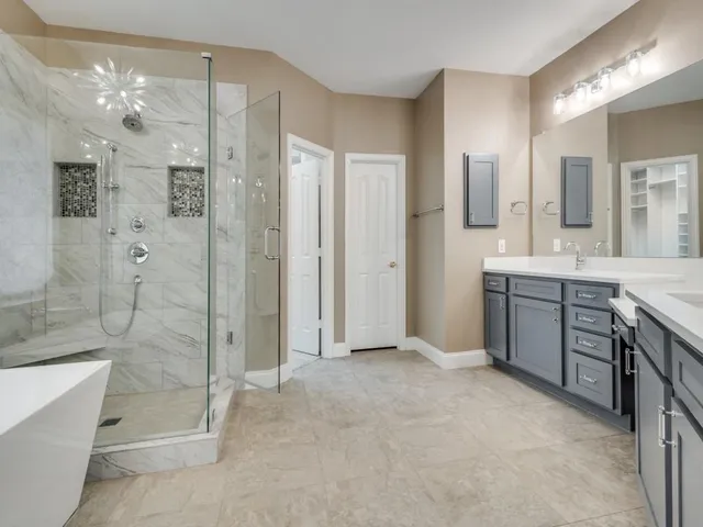 a view of an empty room with a closet