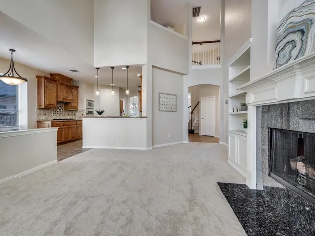 a view of a kitchen and a window