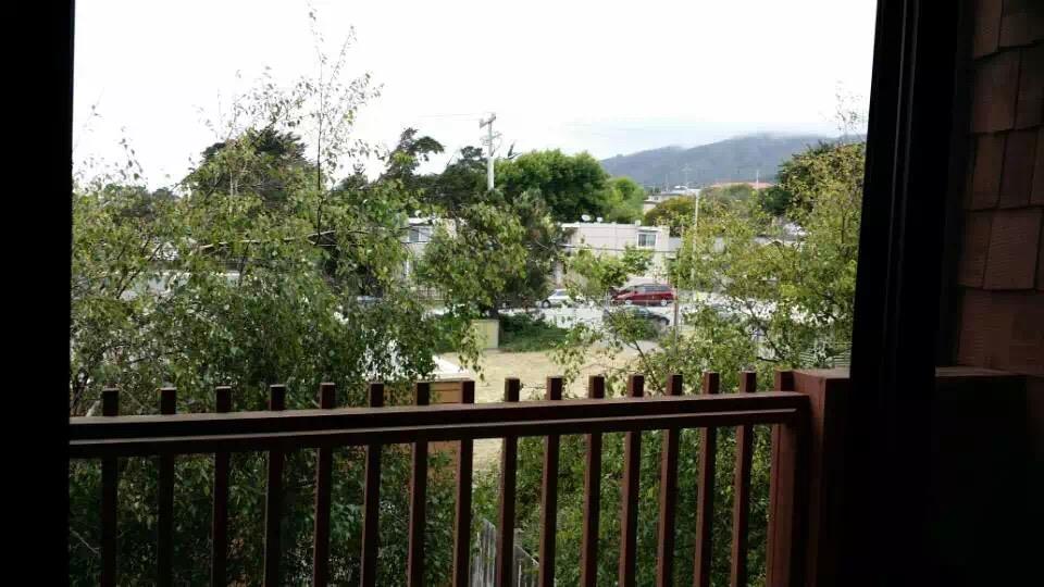 930 Mission Road, Unit 38 South San Francisco, CA 94080 - Photo 5 of 5 a view of a balcony with wooden floor and fence