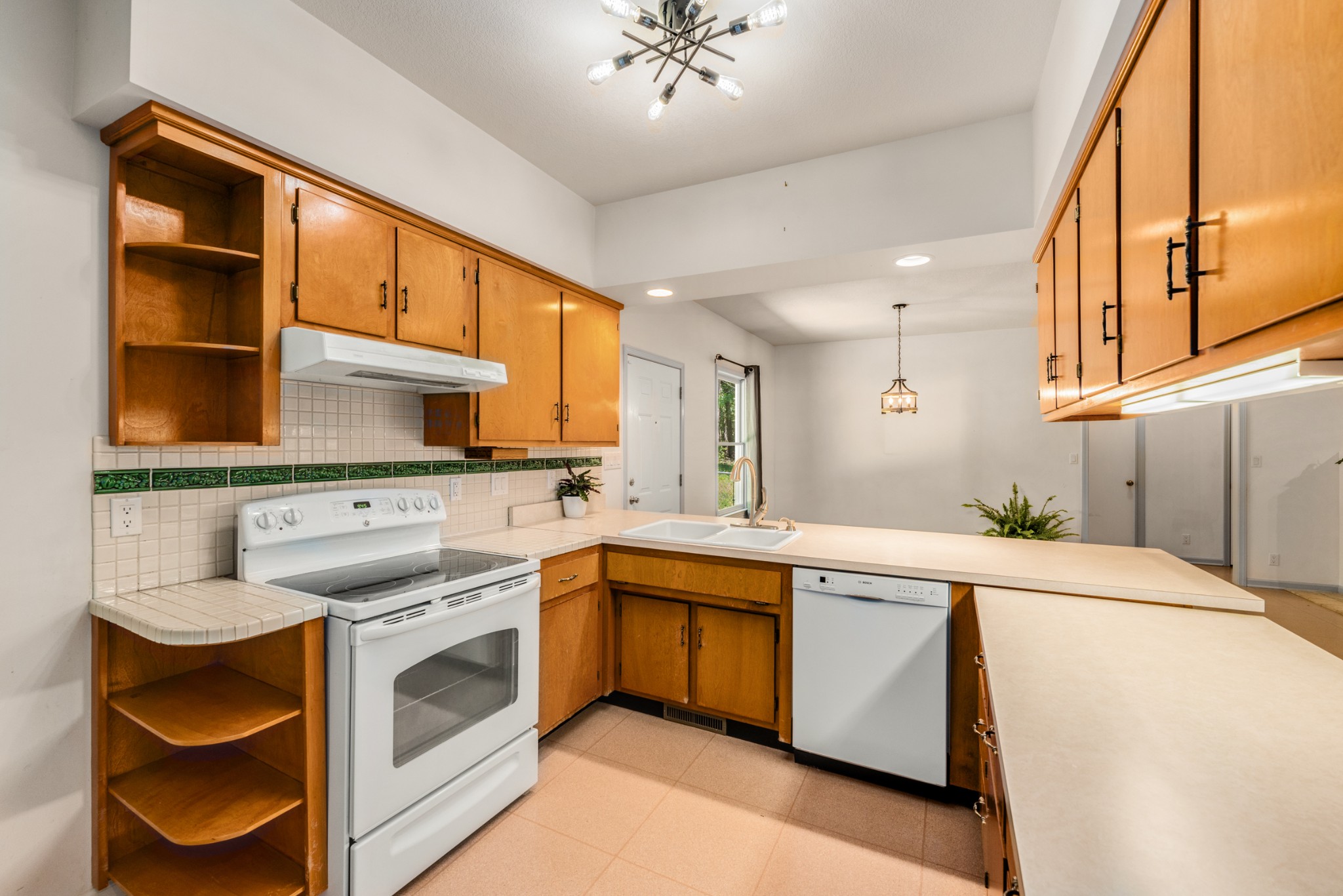 358 Harper Road Clarksville, TN 37043 - Photo 12 of 34 a kitchen with a sink and cabinets